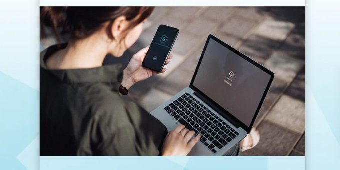 A woman looking at her laptop.
