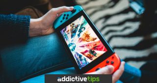 Person holding Nintendo Switch