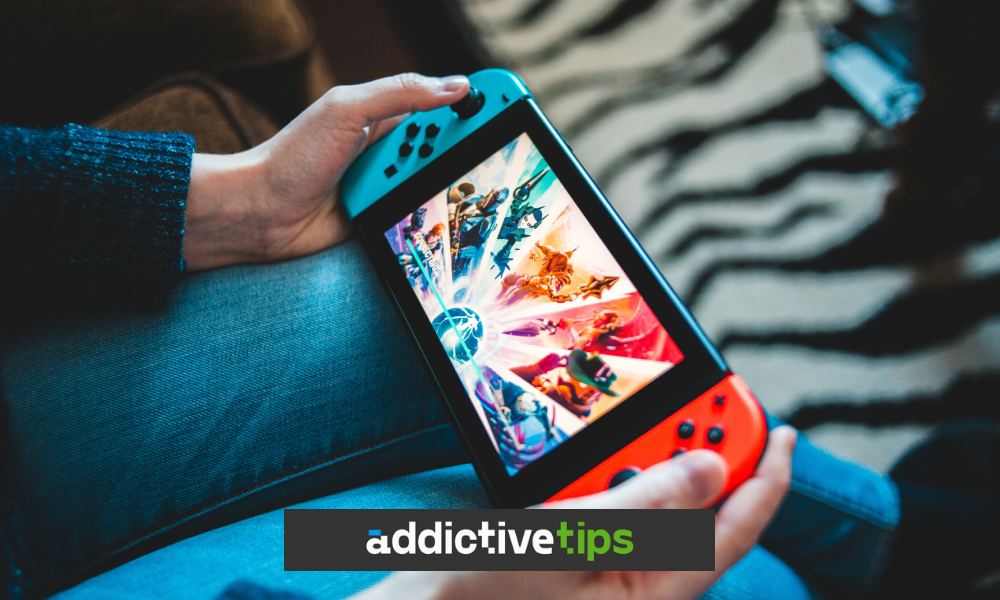 Person holding Nintendo Switch